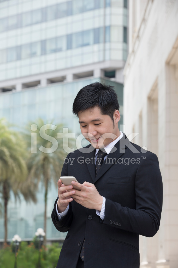 Business man using a. Businessman clipart businessman chinese