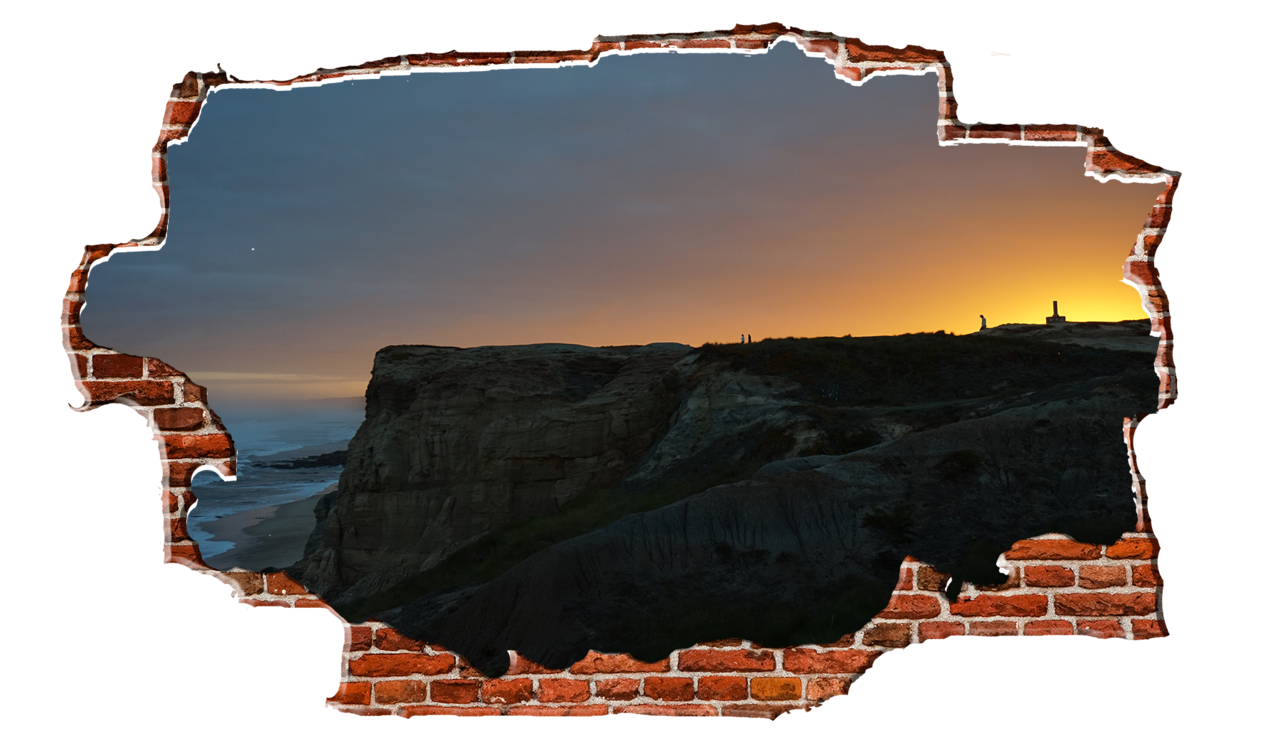 Ocean sunset breaking wall. Cliff clipart beach rock