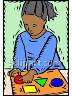 African American Child Playing with Wooden Shapes Puzzle - Royalty ...