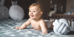 When do babies roll over? Pediatricians answer all of your ...