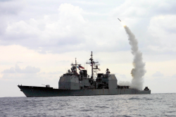 A Tomahawk Land Attack Missile (tlam) Launches From The Guided ...