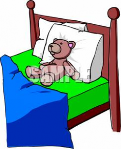 A Stuffed Bear Laying In Bed, Propped Up on a Pillow - Royalty Free ...