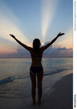 Silhouette Of Woman With Outstretched Arms On Beach Stock Photo ...