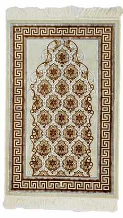 A prayer space in a Muslim house includes a traditional prayer rug ...