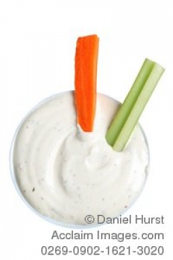 Stock Photo of Celery and Carrot Sticks in Bowl of Dip