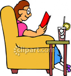 A Person Sitting In a Chair and Reading a Book with a Cold Drink ...