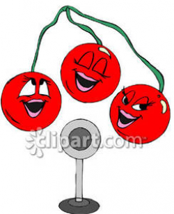 Three Cherries Singing Into a Microphone - Royalty Free Clipart Picture