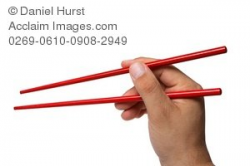 Stock Photo of Hand Holding Chopsticks