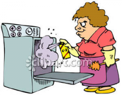 A Woman Cleaning Her Oven - Royalty Free Clipart Picture