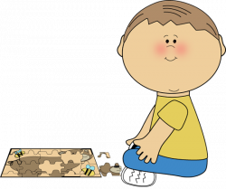 Boy playing with a puzzle from MyCuteGraphics | School Kids ...