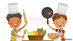 Boys cooking Small boys cooking together with friends in ...