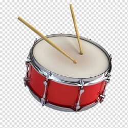 Red and white snare drum and beige drumsticks, A snare drum ...