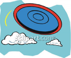 A Frisbee Flying Through the Air Royalty Free Clipart Picture