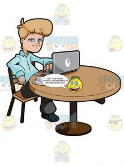 Man Sitting At A Table Working On A Laptop
