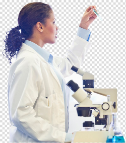 Woman holding test tube beside microscope, Science Light ...