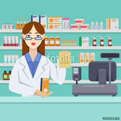 Young female pharmacist with pills behind the counter ...