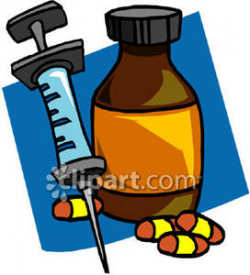 A Syringe With a Medication Bottle and Pills - Royalty Free ...