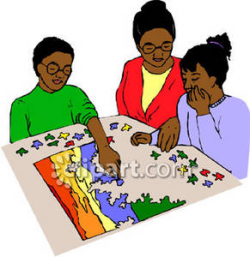 Family Doing A Jigsaw Puzzle - Royalty Free Clipart Picture